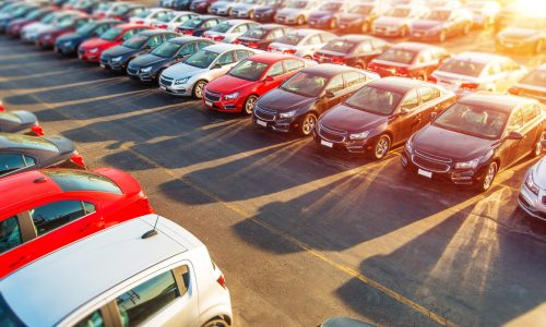 Dealer New Cars Stock Dealer New Cars Stock. Colorful Brand New Compact Vehicles For Sale Awaiting on the Dealer Parking Lot. Car Market Business Concept.