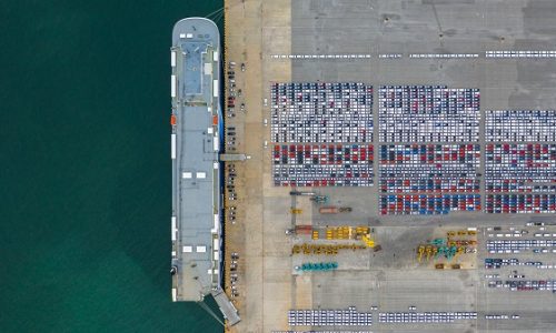 Aerial view cars export terminal, New cars waiting for import export at deep sea port.