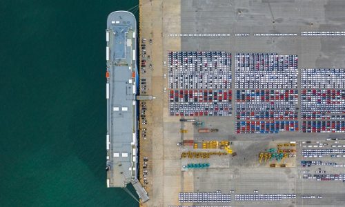 Aerial view roll on roll off RORO vessel Aerial view cars export terminal, New cars waiting for import export at deep sea port.